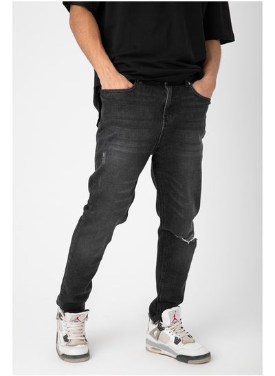 Buy MEN JEANS CARROT RIPPED in Egypt