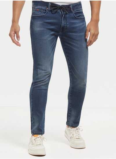 Buy Mid Wash Slim Fit Jeans in Saudi Arabia