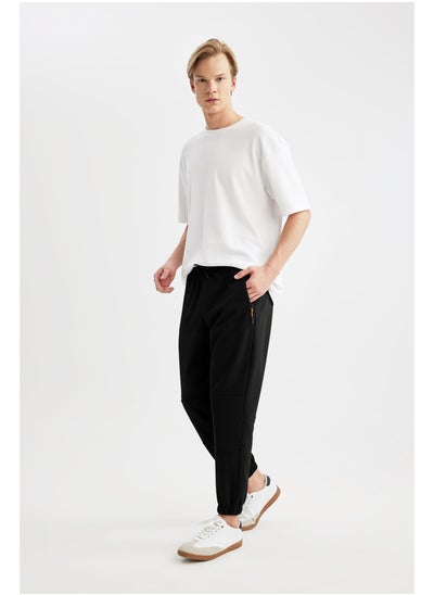 اشتري Man Regular Fit Knitted Trousers في مصر