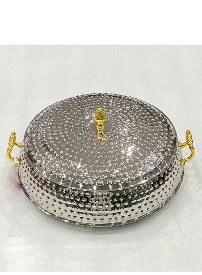 Buy A decorative serving pot made of stainless steel, silver, and golden handles, an attractive royal touch. in Saudi Arabia