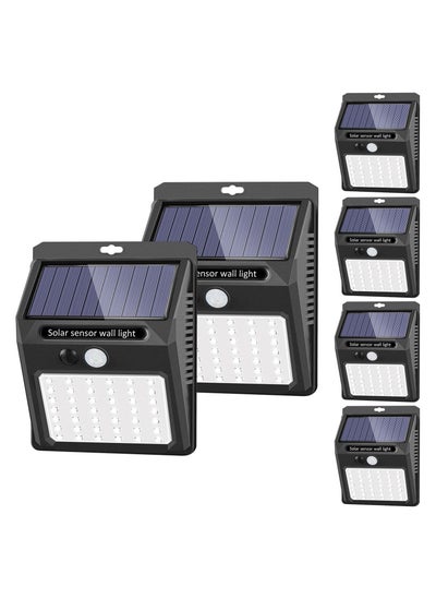 اشتري ELTERAZONE Solar Lights Outdoor [6 Pack/3 Working Mode], SEZAC Security Motion Sensor Wireless IP 65 Waterproof for Garden Fence Patio Garage (42 LED) في الامارات