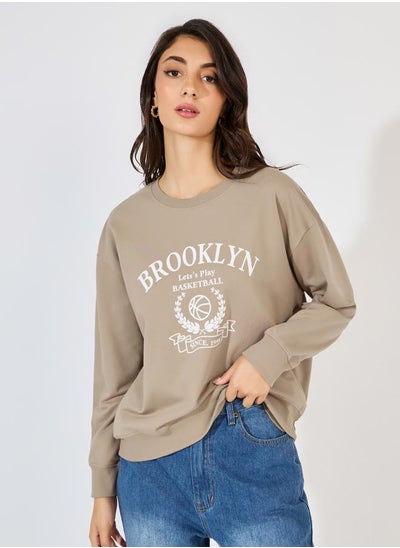 Buy Regular Fit Longline Graphic Sweatshirt with Neck Rib Detail in Saudi Arabia