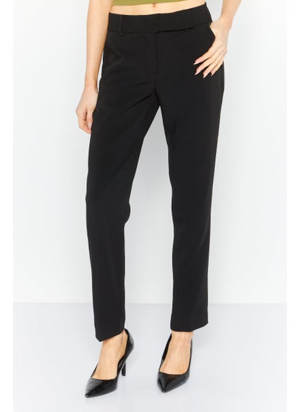 Buy Women Solid Stretchable Skinny Leg Pants, Black in UAE