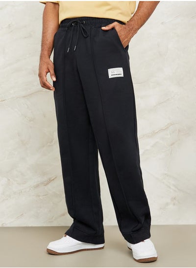 Buy Fleece Pintuck Wide Leg Jogger with Badge Detail in Saudi Arabia