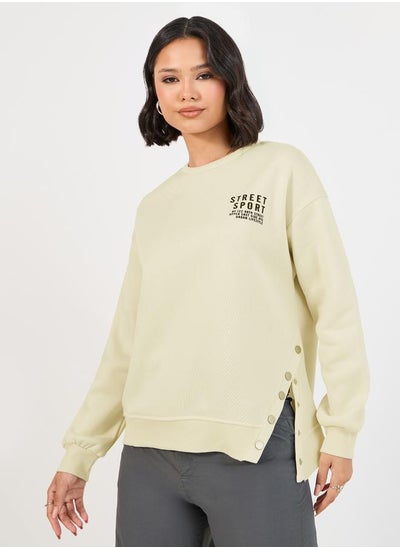 Buy Dropped Shoulder Printed Sweatshirt with Button Detail in Saudi Arabia