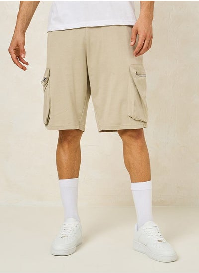 اشتري Solid Oversized Shorts with Cargo Pocket Detail في السعودية