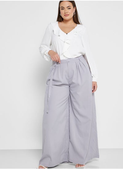 Buy High Waist Belted Flared Pants in UAE