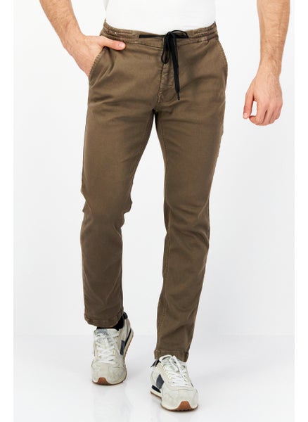 اشتري Men Regular Fit Solid Stretchable Jeans, Tan في السعودية