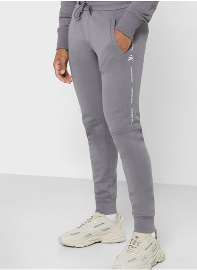 Buy Repeat Logo Sweatpants in UAE