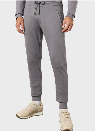 Buy Repeat Logo Sweatpants in Saudi Arabia