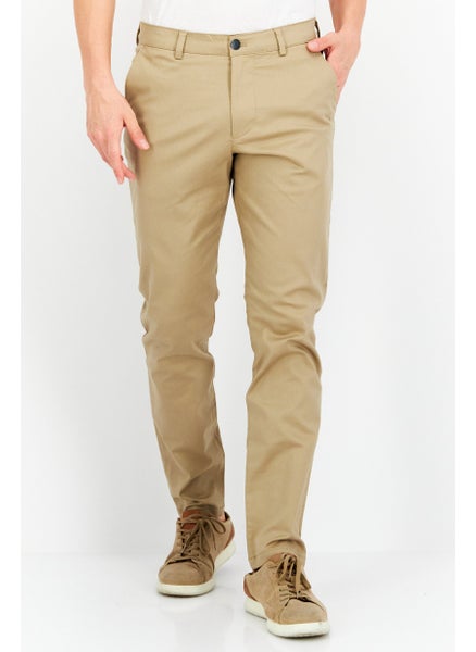 اشتري Men Slim Fit Solid Chino Pants, Beige في الامارات