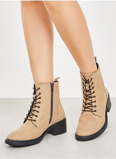 Buy Mid Shaft Block Heel Ankle Boots with Zip Closure in Saudi Arabia