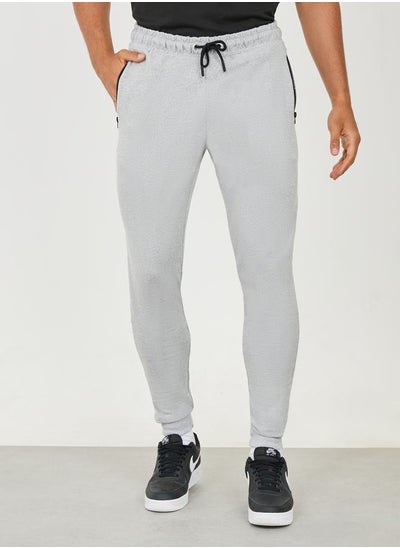 Buy Pique Slim Fit Jogger with Zip Pocket Detail in Saudi Arabia