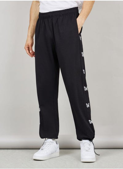 Buy Side Cut & Sew Butterfly Print Relaxed Fit Joggers in Saudi Arabia