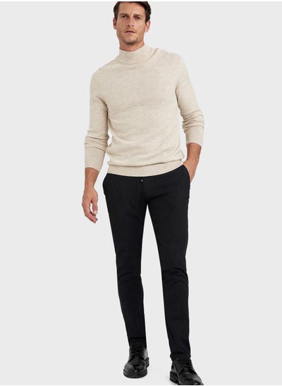 Buy Knitted Turtle Neck Sweater in UAE