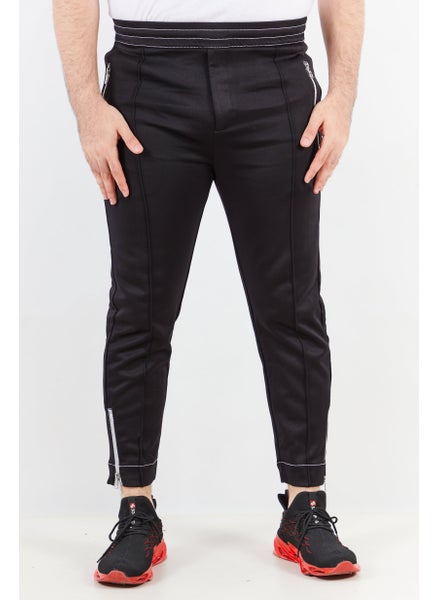 Buy Men Sportswear Fit Outdoor Sweatpants, Black in UAE