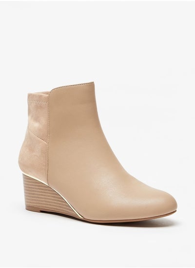 اشتري Women's Solid Ankle Boots with Wedge Heel and Zip Closure في الامارات