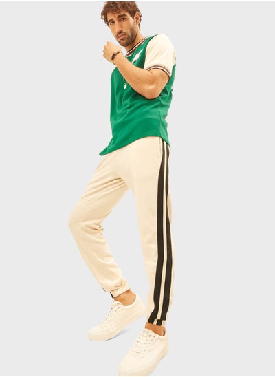 Buy Side Striped Cuffed Sweatpants in UAE