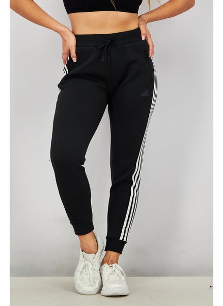 اشتري Women Sportswear Fit Future Icon Outdoor Pants, Black في الامارات