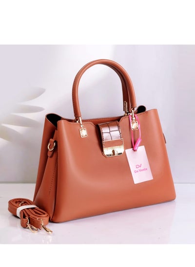 Buy Women's leather handbag with gold clasp accessory with adjustable handle in Egypt