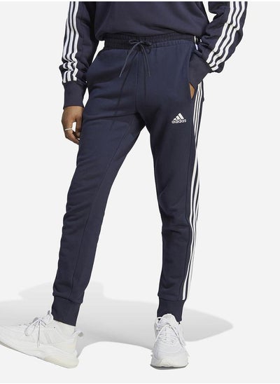 اشتري Essentials French Terry 3-Stripes Cuff Tapered Jogger في السعودية