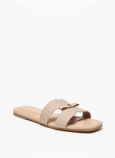 Buy Monogram Print Slip-On Sandals with Bow Applique in UAE