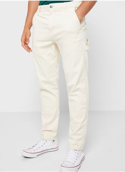 Buy Light Wash Tapered Jeans in UAE