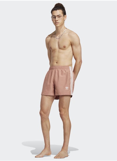 Buy 3 Stripe Adicolor Swim Shorts in UAE