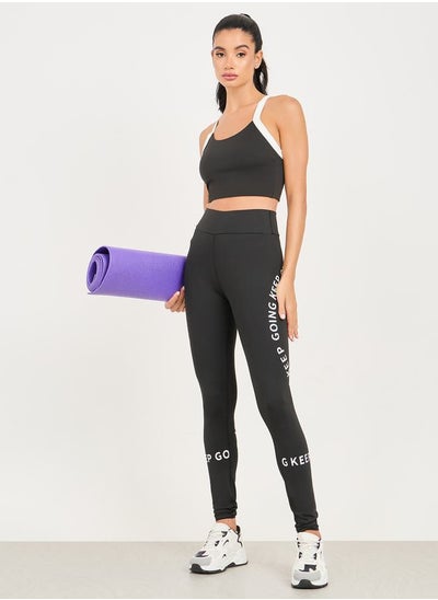 اشتري Slogan Print High Rise Broad Waist Full Length Active Leggings في السعودية