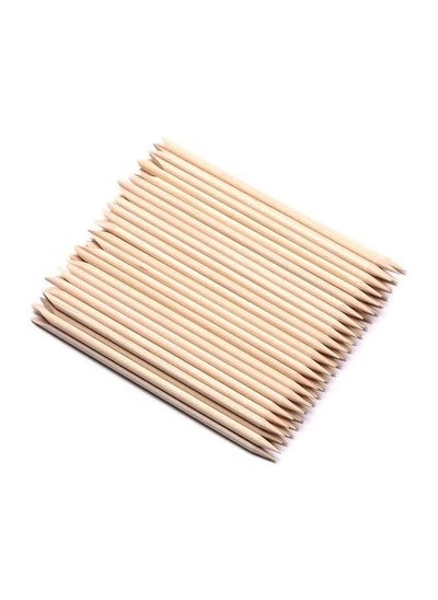 Buy 100-Piece Nail Art Wooden Stick Cuticle Pusher Remover Beige in UAE