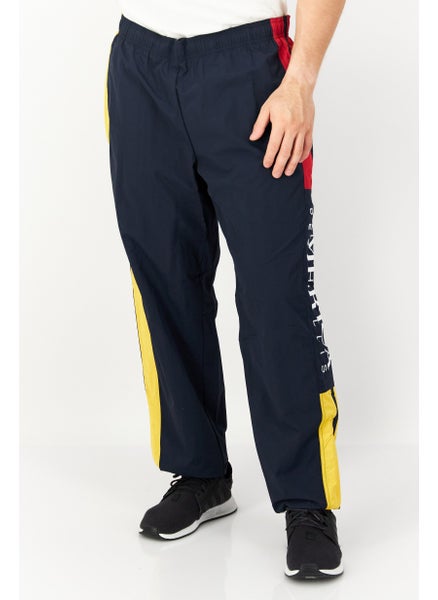 اشتري Men Colorblock Track Pants, Navy/Yellow/Red في الامارات