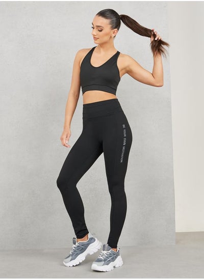 Buy Broad Waistband Side Motivation Slogan Print Full Length Legging in Saudi Arabia