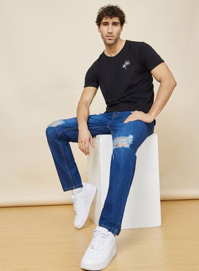 Buy Regular Fit Rigid Mid Wash Cotton Jeans in Saudi Arabia