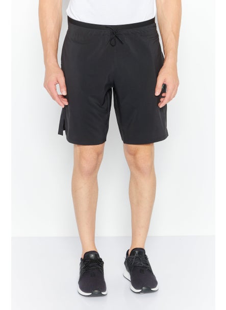 اشتري Men Sportswear Fit Brand Logo Strength Short, Black في الامارات