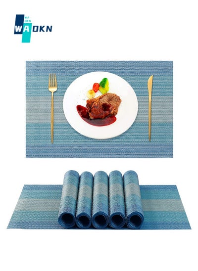 اشتري 4 Piece Placemats, Heat Resistant Washable Placemats, Non-Slip Vinyl Woven Kitchen Table Mats, Stain Resistant Placemats Wipeable PVC Dining Table Durable Kitchen Decor (Blue) في الامارات