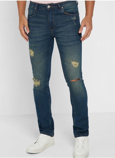 Buy Slim Fit Ripped Jeans in Saudi Arabia