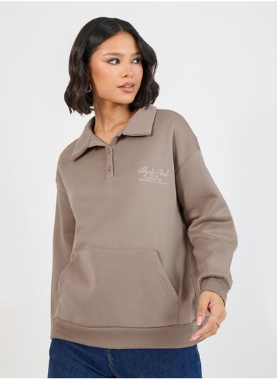 Buy Oversized Longline Polo Sweatshirt with Embroidery Detail in Saudi Arabia