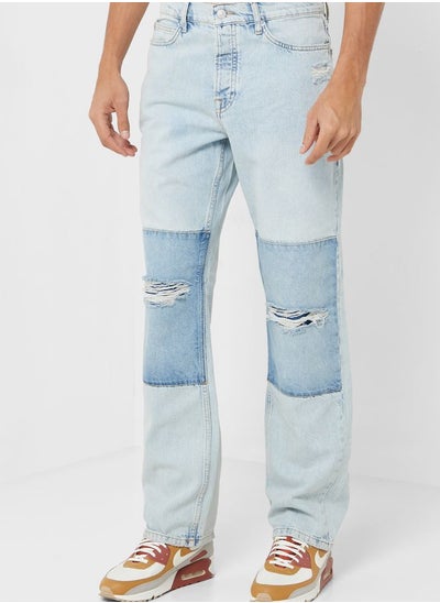 Buy Distressed Light Wash Jeans in UAE