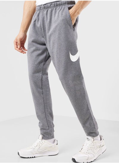 Buy Dri-Fit Taper Swoosh Pants in UAE