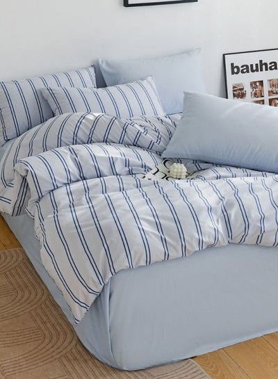 اشتري Premium Voque Design Plain Blue Bedsheet And Striped Duvet Cover King size Without Filler Includes :1 Duvet cover - 220*240cm. 1 Fitted sheet - 200*200cm+30cm. 4Pillow cases - 50*75cm في الامارات