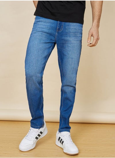 Buy Slim Fit Stretch Cotton Mid Washed Jeans in Saudi Arabia