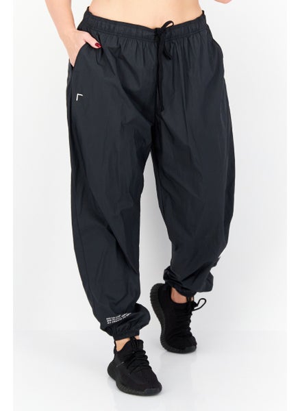 Buy Women Loose Fit Training Track Pants, Black in UAE