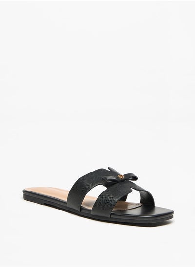 Buy Monogram Print Slip-On Sandals with Bow Applique in Saudi Arabia