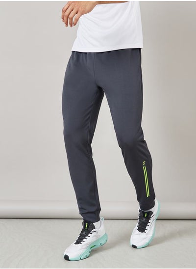 Buy Side Contrast Striped and Logo Detail Training Trackpants in Saudi Arabia