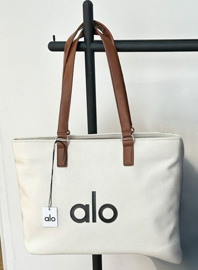 ALO YOGA Simple Large Capacity Tote Bag Shopping Bag Yoga Single Shoulder  Canvas Bag Women's Sports and Leisure Trendy Fitness Bag price in Saudi  Arabia | Noon Saudi Arabia | kanbkam