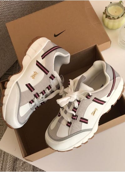 Buy Nike Jacquemus sneakers in beige-white in Saudi Arabia