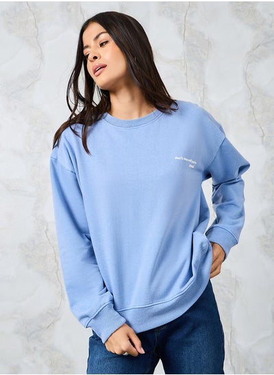 Buy Regular Fit Slogan Print Round Neck Sweatshirt in Saudi Arabia