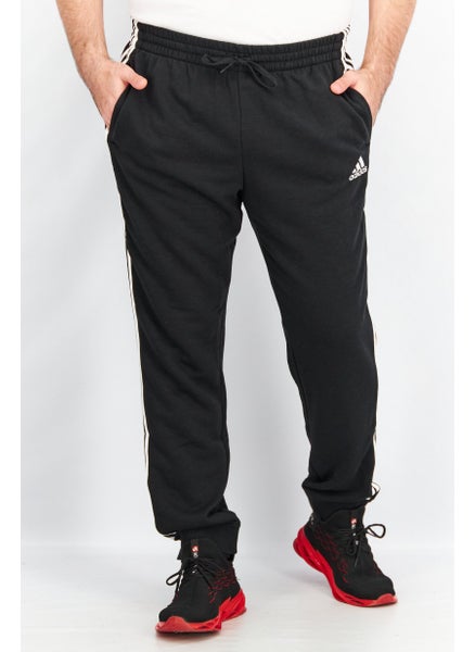 اشتري Men Sportswear Fit Essentials French Terry 3-Stripes Pants, Black/White في الامارات