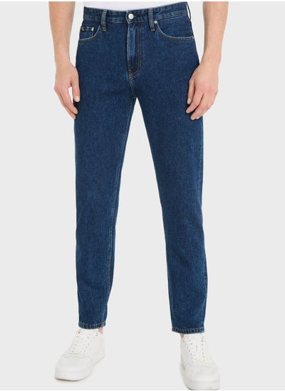 Buy Mid Wash Taper Jeans in UAE