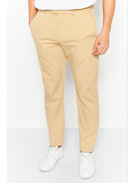 Buy Men Slim Fit Stretchable Solid Chino Pants, Beige in UAE